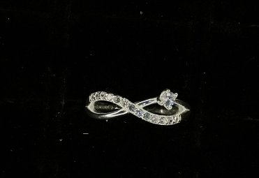 ANILLO INFINITO CON FLORECITA